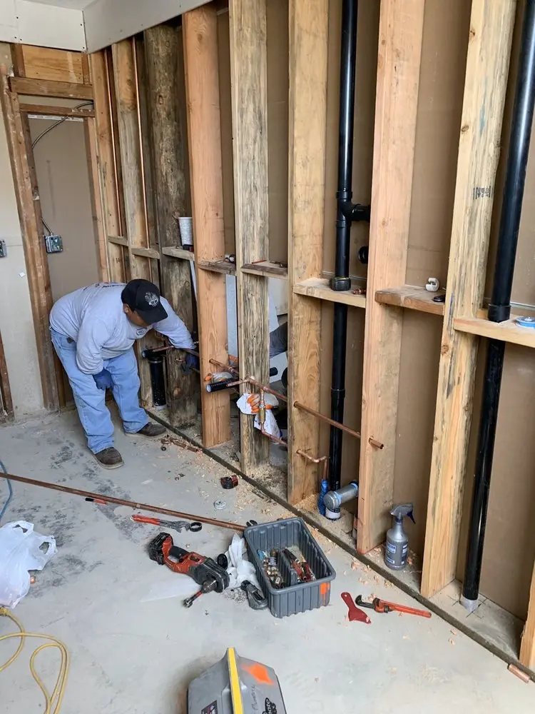 Commercial rough-in plumbing for Water Heater Replacement in Normandy Heights
